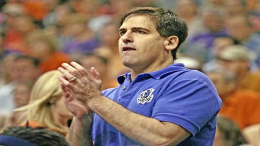 Dallas Mavericks owner Mark Cuban reacts as his team plays the Phoenix Suns in Game 3 of their NBA Western Conference finals basketball game Sunday, May 28, 2006, in Phoenix. (AP Photo/Chris Carlson)