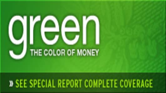 green_tcom_badge.jpg