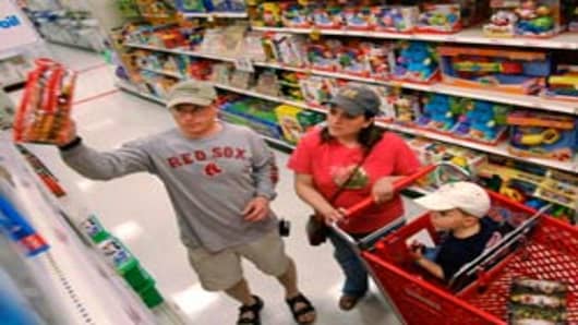 Parents shop in the toy aisle at a Target store, Kingston, Massachusetts