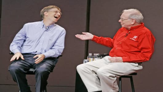 Billionaire investor Warren Buffett, right, and Microsoft Chairman Bill Gates participate in a Q & A session with students at the University of Nebraska-Lincoln's College of Business Administration, in Lincoln, Neb., Friday, Sept. 30, 2005.(AP Photo/Nati Harnik)