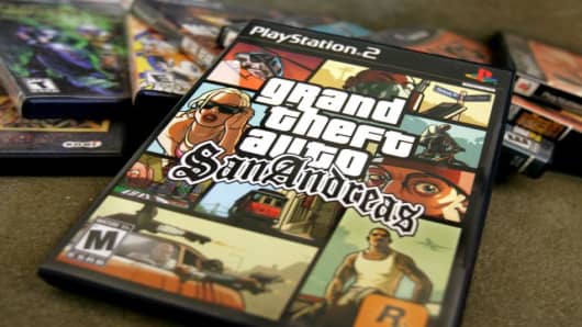 A copy of the hot selling video game, Grand Theft Auto-San Andreas, is shown with other video games at the home of Coleman Garrett in Palo Alto, Calif., Wednesday, July 20, 2005. The video game industry bowed to pressure from politicians Wednesday and changed the rating for the sex-infused game Grand Theft Auto-San Andreas. The company says it's working on a version of the game with enhanced security to prevent modifications that allow access to sexual content. Rockstar Games says it's stopped m