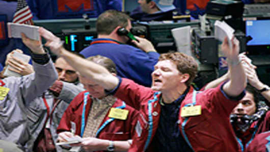 Traders buy and sell crude oil futures contracts at the New York Mercantile Exchange.