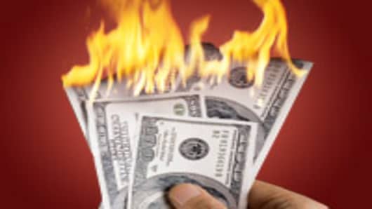 Image result for wealthy 1 percent burning money