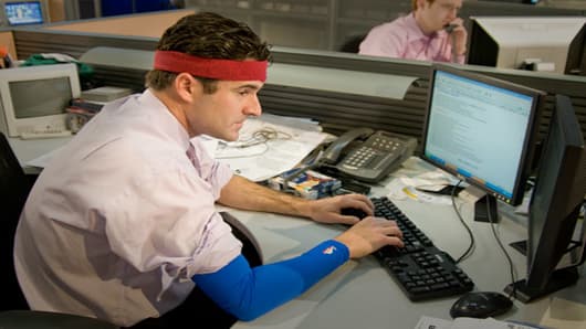 Darren Rovell wearing the shooting sleeve and headband.