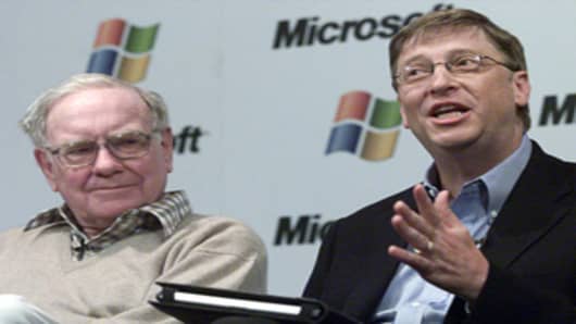Warren Buffett and Bill Gates in a 2003 file photo