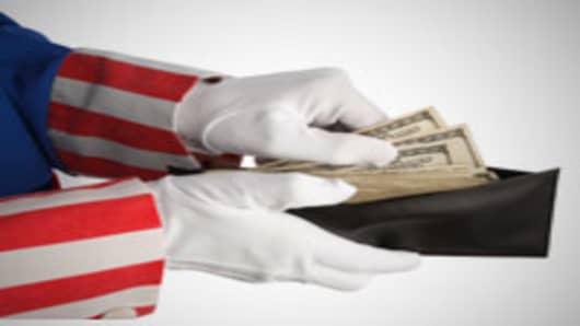 Uncle Sam taking money out of your wallet