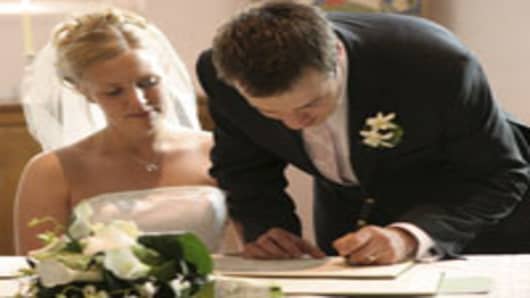 married_couple_signing_200x150.jpg