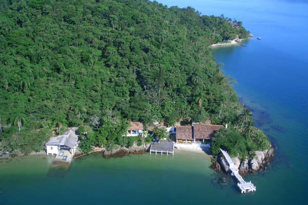 : $2.6 million For the couple looking for seclusion, set your sites on this island right off the coast of the city of Mangaratiba. Listed for sale with ., Isla Bonita has four sandy beaches, four houses and a spot to land the helicopter. »