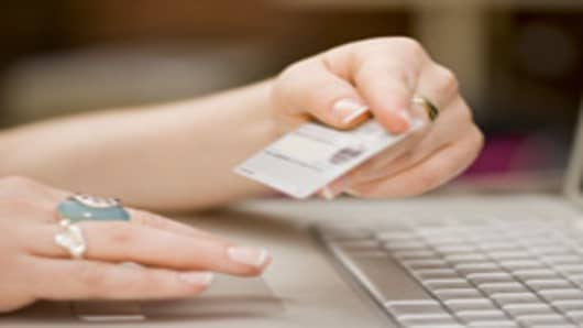 Online shopping with a credit card.