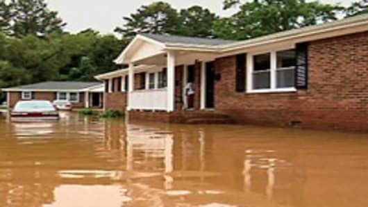 House surrounded by floodwater