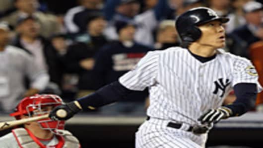 Hideki Matsui of the New York Yankees hits a 2-run double in the bottom of the fifth inning against the Philadelphia Phillies in Game Six of the 2009 MLB World Series.