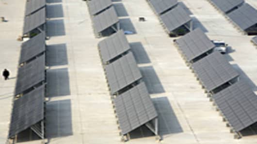 Solar panels at a solar photovoltaic power station under construction in Xining of Qinghai Province, China.