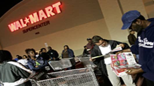 People stand in front of a Walmart store before the doors open at 5am on 'Black Friday' in Miami, Florida.