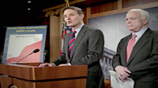 Sen. Evan Bayh and Sen. John McCain during a news conference on their bill aimed at reining in government spending and to address the national debt.
