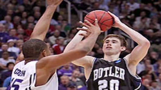 Gordon Hayward #20 of the Butler Bulldogs puts up a shot over Luis Colon #15 of the Kansas State Wildcats during the west regional final of the 2010 NCAA men's basketball tournament.