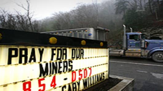 A truck drives down the road near the Upper Big Branch Mine in Montcoal, West Virginia.
