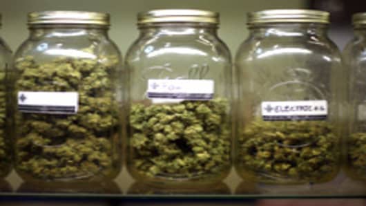 Jars filled with various types and grades of Marijuana.
