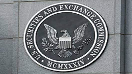 The U.S. Securities and Exchange Commission seal hangs on the facade of its building in Washington, DC.