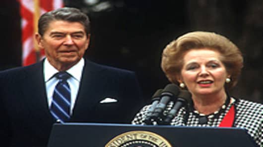 President Ronald Reagan watches as British Prime Minister Margaret Thatcher speaks November 16, 1988 in Washington, DC.