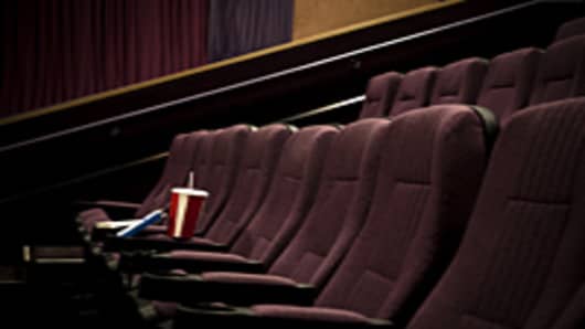 Lone drink and candy in empty theater