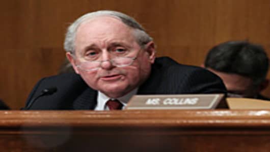 Chairman Carl Levin questions former and current Goldman Sachs employees during a Senate Homeland Security and Governmental Affairs Investigations Subcommittee hearing on Capitol Hill.
