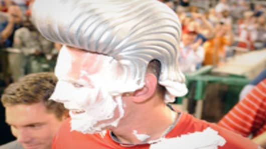 Stephen Strasburg #37 of the Washington Nationals gets shaving cream in the face after his first major league victory against the Pittsburgh Pirates at Nationals Park.