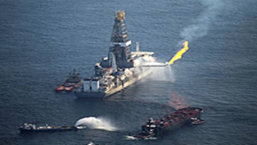A flare burns from a drill ship recovering oil from the ruptured British Petroleum oil well over the site in the Gulf of Mexico on June 9, 2010 off the coast of Louisiana. The spill has been called the largest environmental disaster in American history.