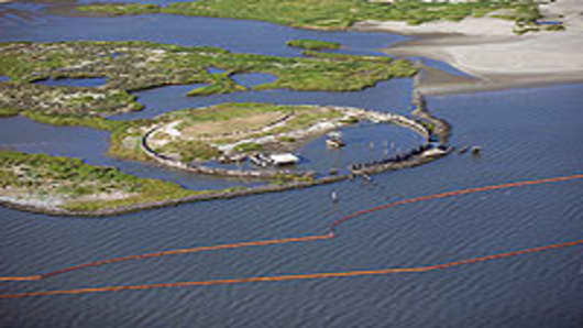 Booms laid for protection at Breton National Wildlife Refuge, near Venice, LA.