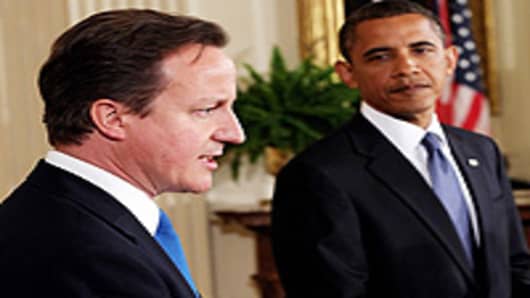 British Prime Minister David Cameron (L) and U.S. President Barack Obama hold a joint news conference in the East Room of the White House July 20, 2010 in Washington, DC.