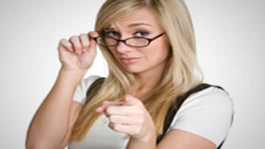 woman_with_glasses_pointing_200.jpg