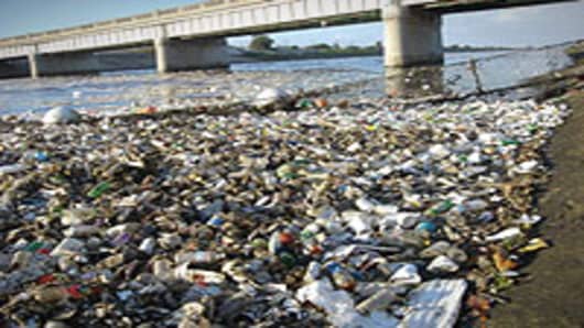 Plastic waste washed up in the Los Angeles River after a storm.