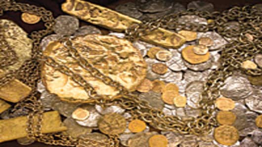 A sample of gold bars, coins and jewelry recovered from the $450 million treasure cache discovered on the Atocha shipwreck.