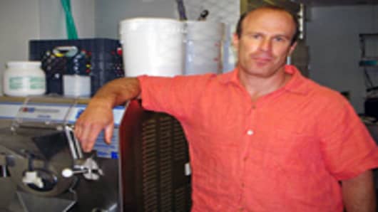 Mark Mallen, owner of Mile High Ice Cream, pictured with a 10-gallon ice cream maker at the commercial kitchen near downtown Denver where employees make cannabis-infused "edibles" for medical marijuana patients.