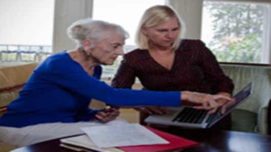 elderly woman with financial advisor