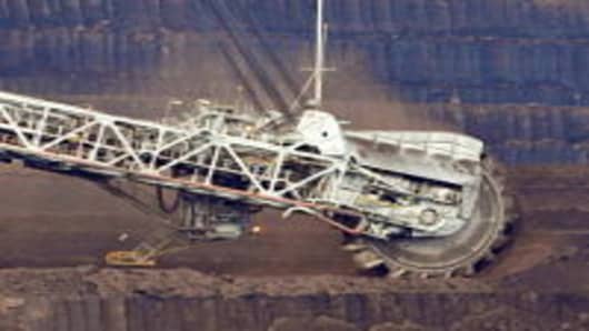 A coal dredger tears coal from the face of the Loy Yang Open Cut coal mine in the Latrobe Valley, 150km east of Melbourne on August 13, 2009.