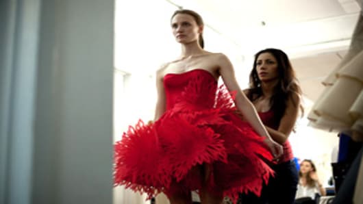 Irina Shabayeva fits one of her ready to wear pieces on her models two days before her runway show in Lincoln Center.