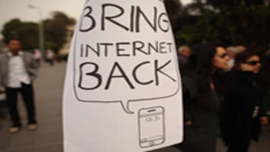 A poster placed on a lamp post calls for the return of the internet after it was shut down by the government on February 1, 2011 in Cairo, Egypt.