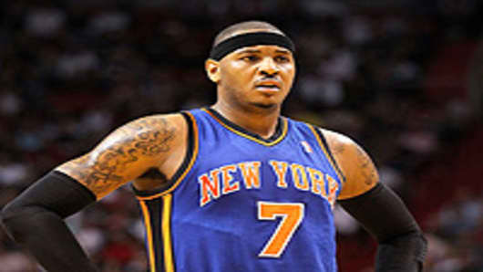 Carmelo Anthony of the New York Knicks stands on the court during a game against the Miami Heat at American Airlines Arena on February 27, 2011 in Miami, Florida.