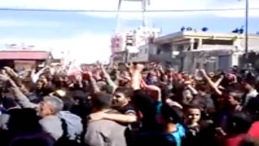This footage purportedly show protests in the southwestern town of Daraa on 18th March 2011.