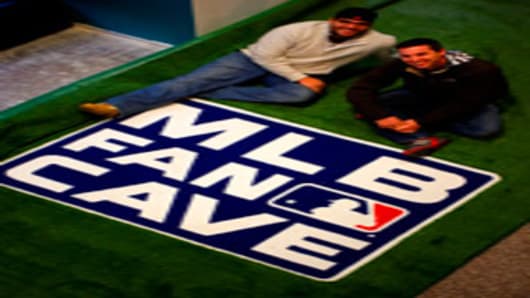 Ryan Wagner (left) and Mike O'Hara (Right) get used to their Fancave created by Major League Baseball.