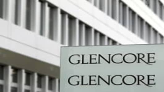 The Glencore logo seen in front of the Swiss commodities giant's headquarters in Baar.