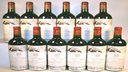 Lot #450 Est. Price $3,200-3,800 - Château Mouton-Rothschild (1996) 12 bottles