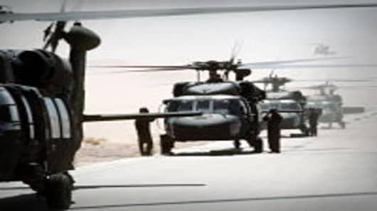 FILE PHOTO: UH-60A Black Hawk helicopters prepare to takeoff as the 82nd Aviation Brigade relocates in the desert during Operation Desert Shield. (photo by DOD)