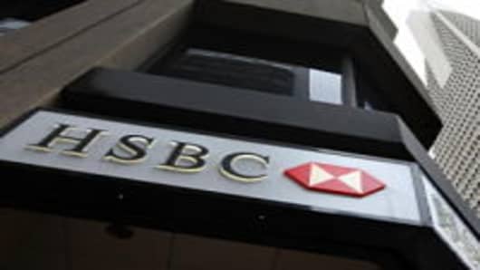 The HSBC logo is displayed on the exterior of an HSBC bank branch March 2, 2009 in San Francisco, California. After taking a financial hit with sub-prime mortgage-backed securities, HSBC Holdings PLC reported that due to a 70 percent drop in 2008 net profits it plans to slash 6,100 jobs and close its consumer loan business in the U.S.