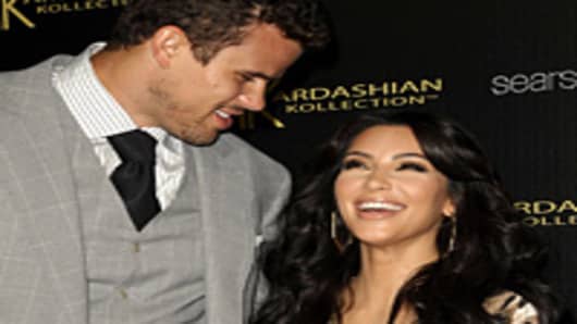 Kris Humphries and Kim Kardashian attend the Kardashian Kollection launch party at The Colony on August 17, 2011 in Hollywood, California.