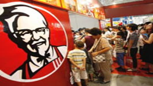 Customers line up to buy Kentucky Fried Chicken in Beijing.