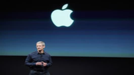 Apple CEO Tim Cook speaks at the event introducing the new iPhone at the company’s headquarters October 4, 2011 in Cupertino, California. The announcement marks the first time Cook introduces a new product since Apple co-founder Steve Jobs resigned in August.