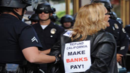Occupy Wall Street protester being arrested in California