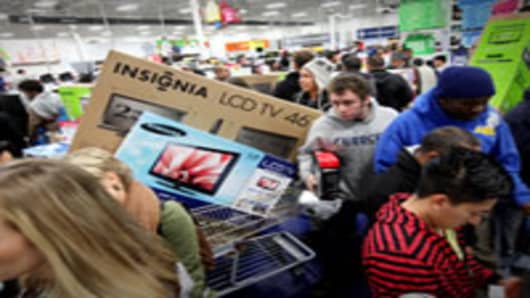 Customers shop for electronics items during 'Black Friday' at a Best Buy store in San Diego, California.