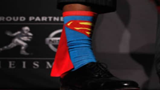 A detail view of Heisman Memorial Trophy Award winner Robert Griffin III of the Baylor Bears showing his Superman socks during a press conference at The New York Marriott Marquis.